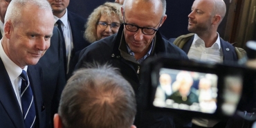 German Chancellor Friedrich Merz arrives at a railway station, amid Russia's attack on Ukraine, in Kyiv